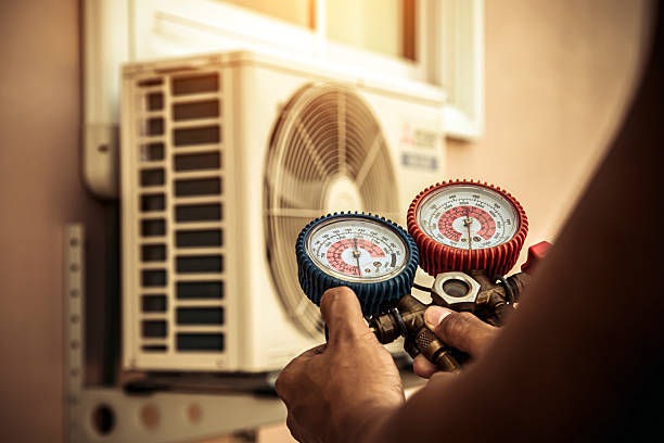 Professional Air Conditioning Service technician working in Jordan, MN